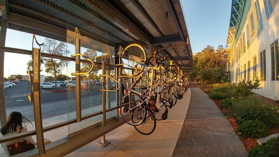 Bike Tracs adorn a shuttle bus drop off at Facebook Menlo Park HQ