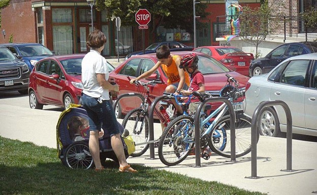 Family Parking Bikes at Outdoor Bike Dock