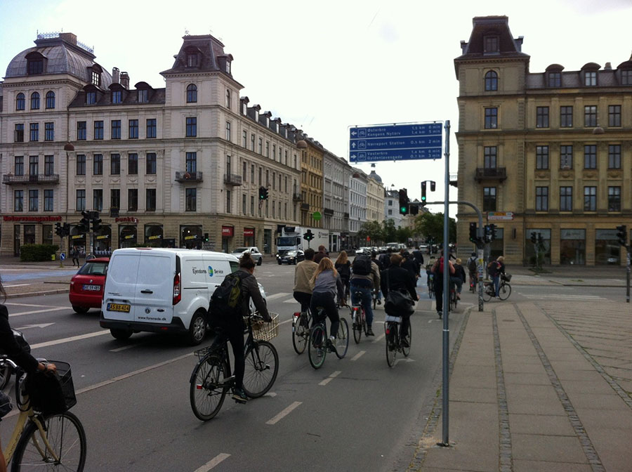 Cyclists riding in a protected bike lane.